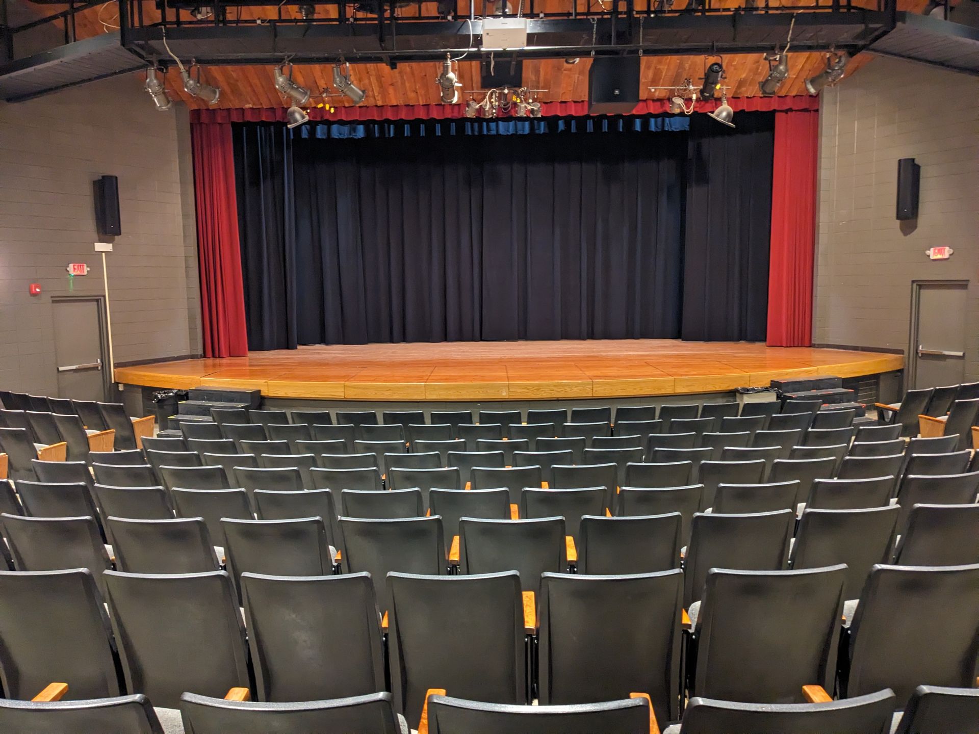 Solar Shield Stage Curtains installed in a school theater