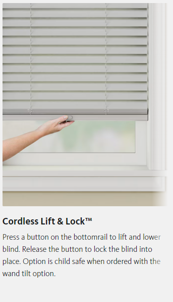 A person is using a cordless lift and lock blind.
