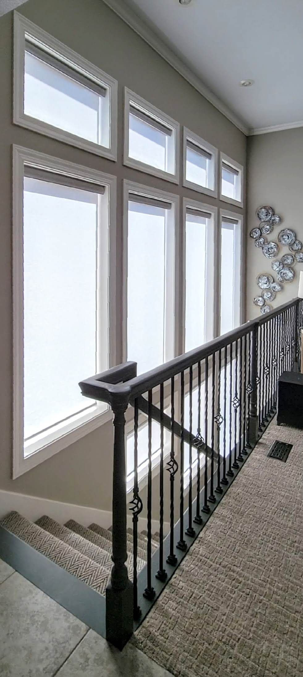 Solar Shield Roller Shades installed in a stairwell