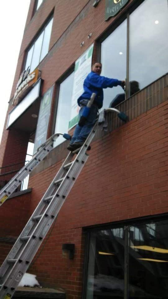 Owner Cleaning Commercial Windows — Hadley, MA — Family Window Cleaning & Property Maintenance