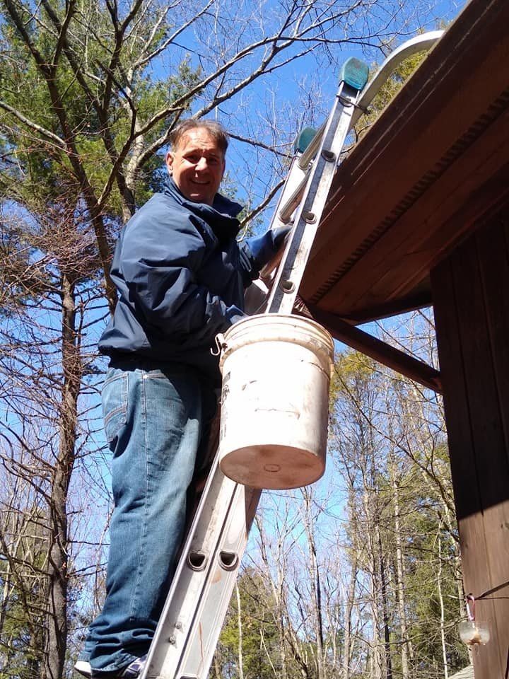 Gutter Cleaning On Ladder — Hadley, MA — Family Window Cleaning & Property Maintenance