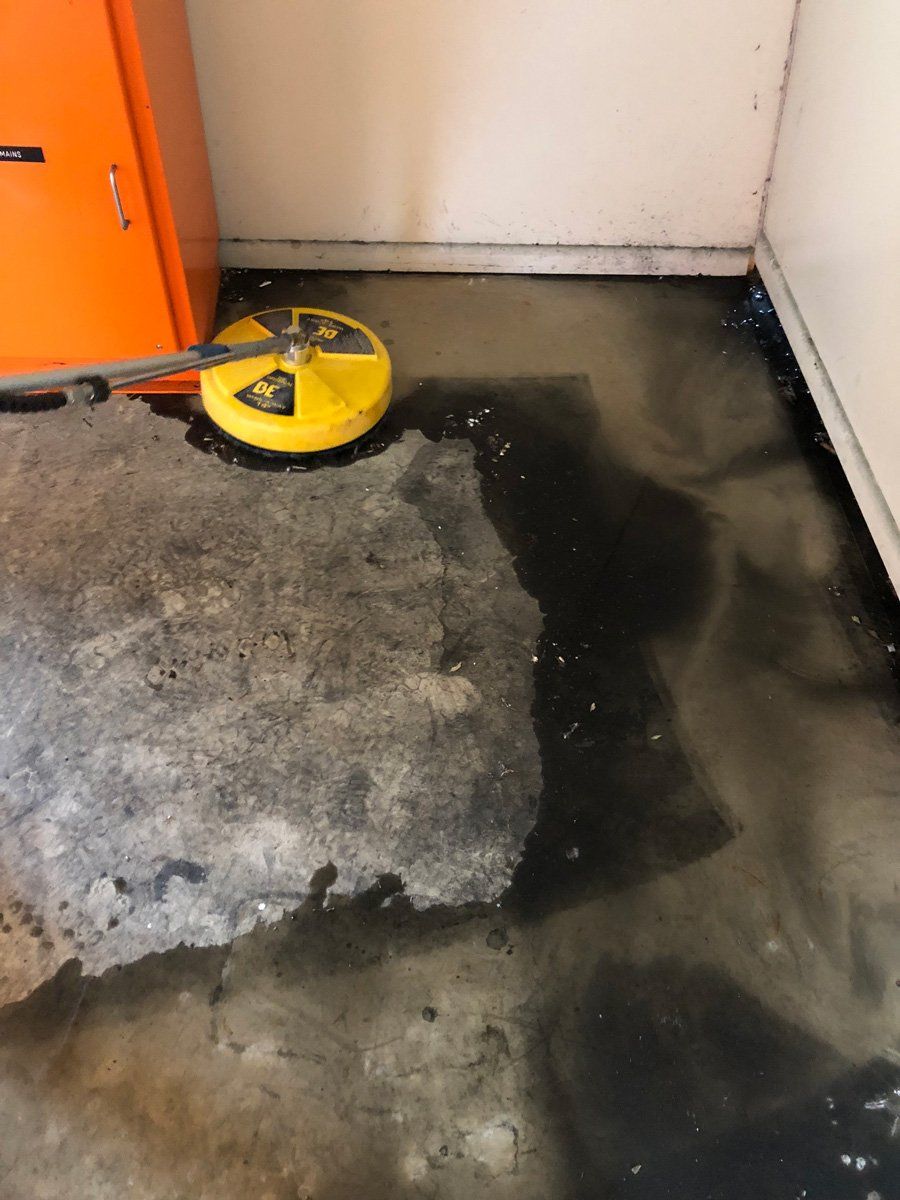 Concrete Floor Cleaning in Progress — Commercial Cleaners in Ballina