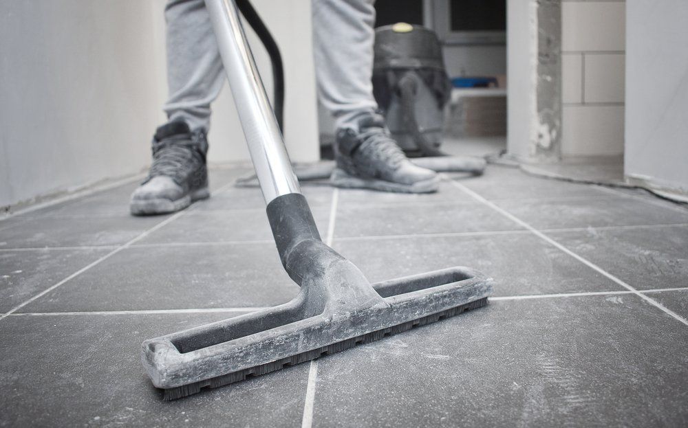 Worker vacuuming the floor —  Construction Cleaning in Casino, NSW