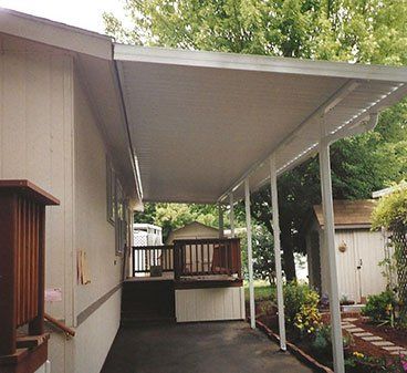 Entrance porch decorated with bench — Porch Repairs in Eugene, OR
