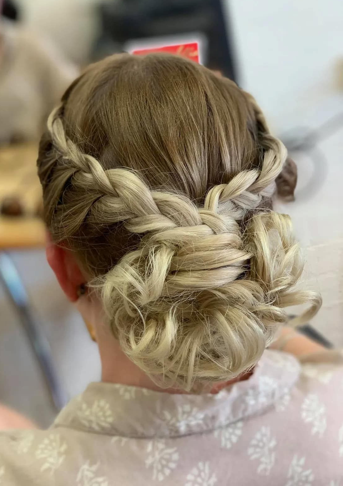 Back View of a Blonde Hairstyle Featuring Two Side Braids — Devyani Hair & Beauty in Unanderra, NSW