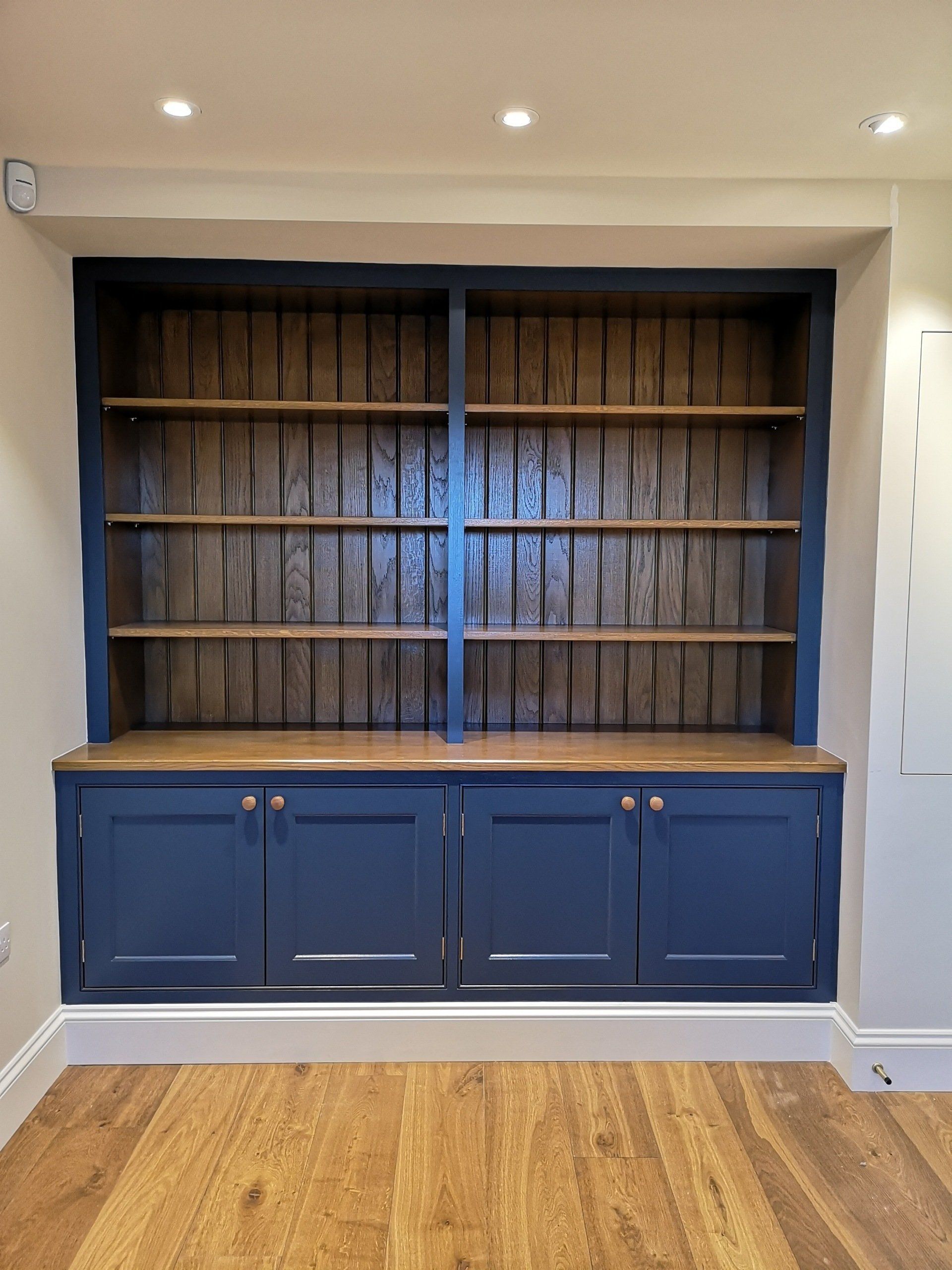 bespoke Oak unit with solid oak shaker doors and adjustable shelves. Painted blue
