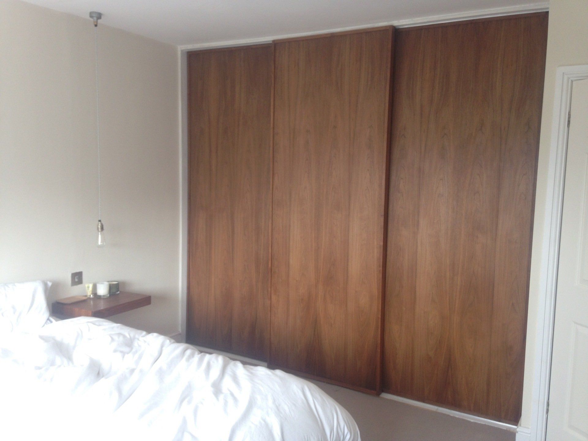 Bespoke Walnut Veneer sliding wardrobe