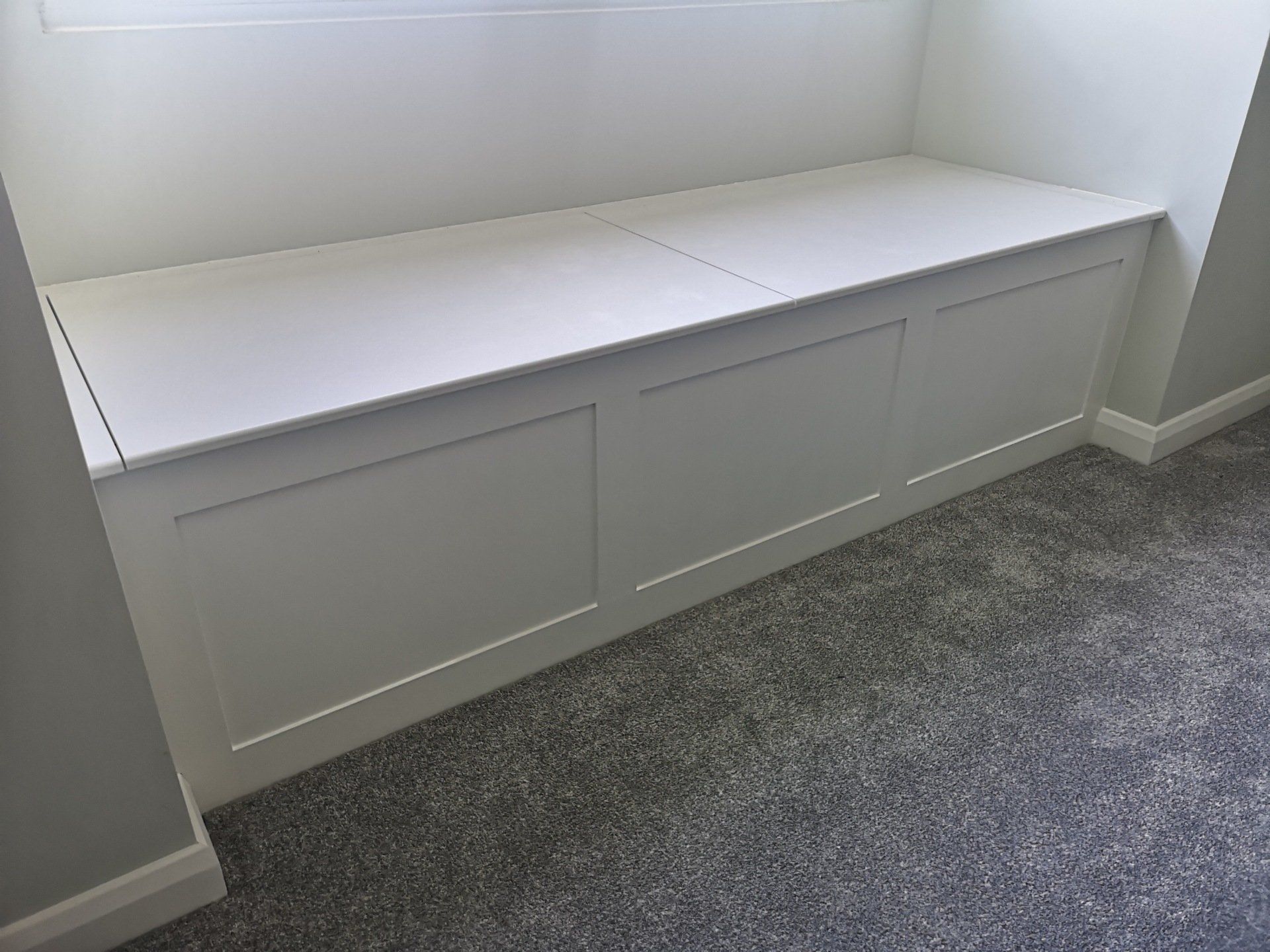 White painted MDF shaker style window seat with lift up lid.