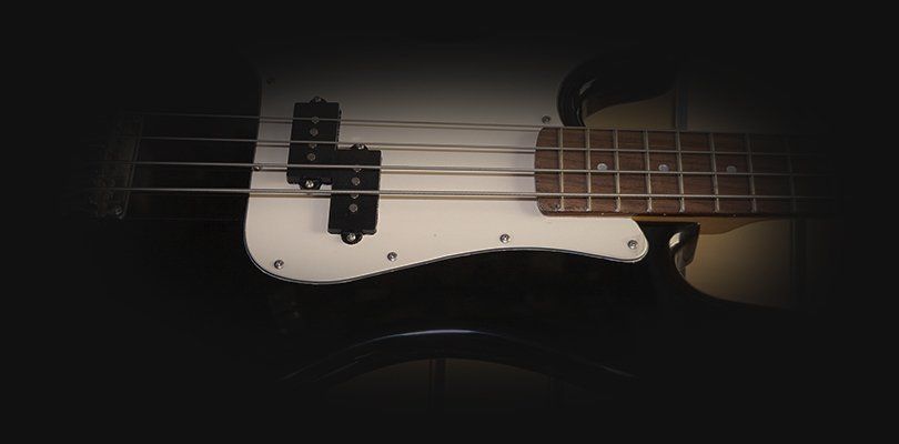 A black and white bass guitar