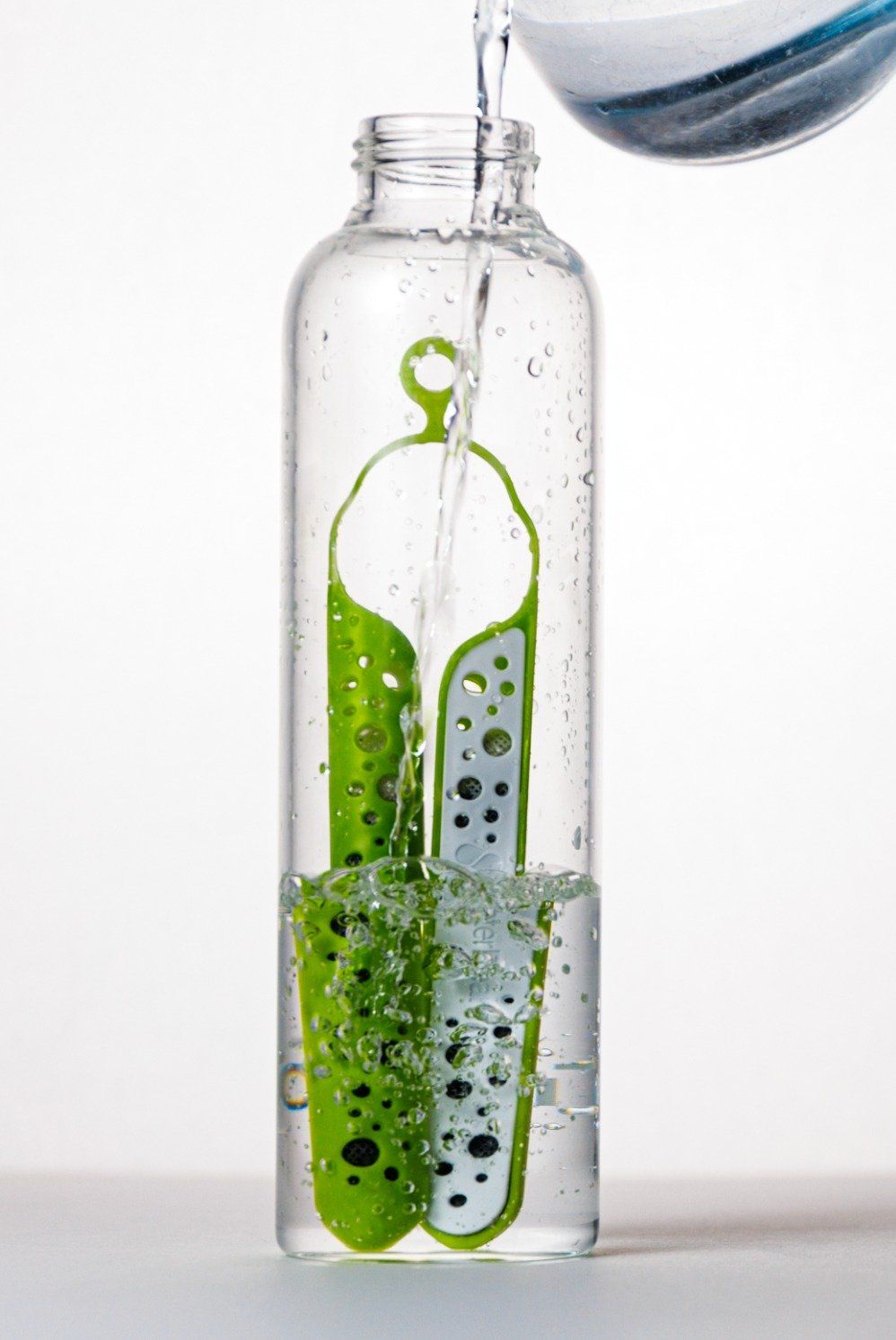 Filter in a bottle with water pour