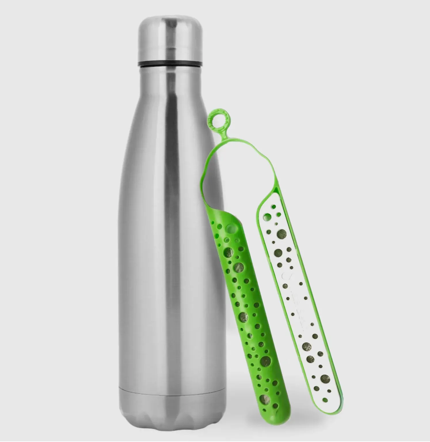 Green filter next to a metal bottle