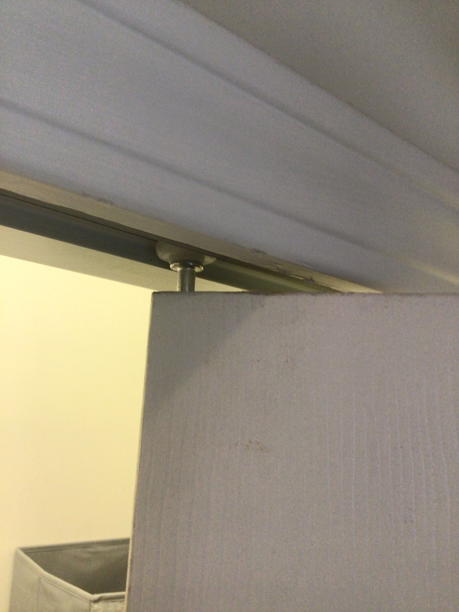A close up of a sliding door in a room.