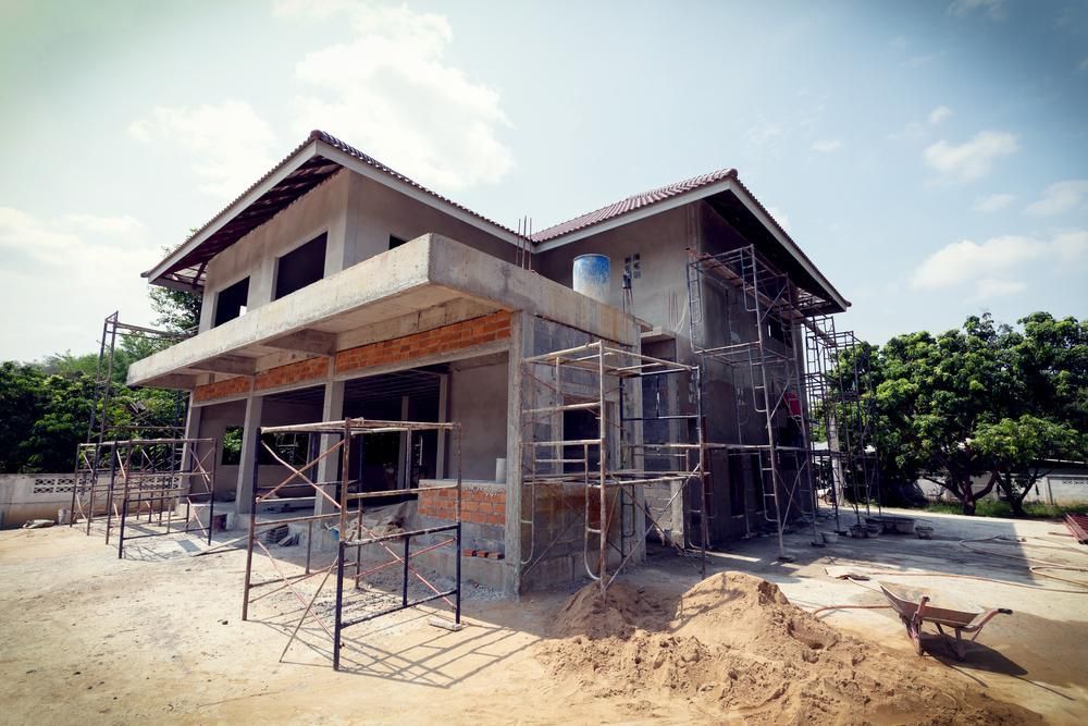 Construction Of A Residential House With Scaffold Steel  — Tuscany Concreting In Airlie Beach, QLD