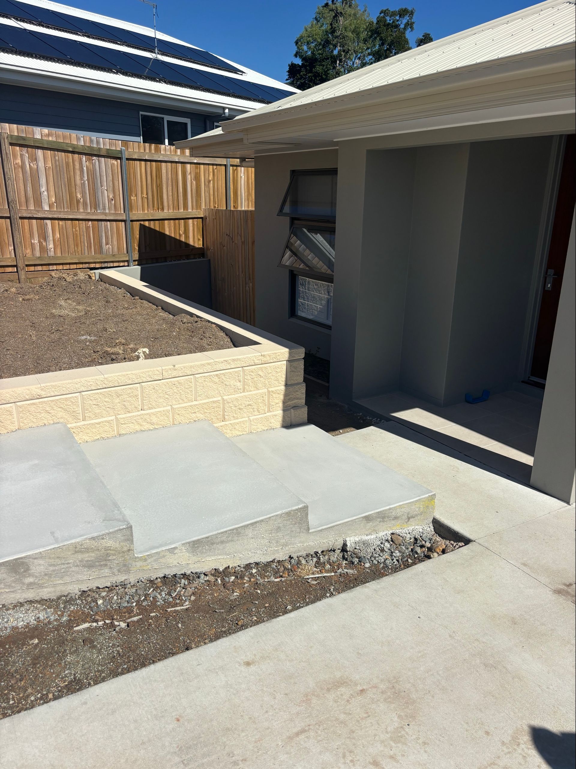 Concrete Brick Wall Built On A Construction Site — Tuscany Concreting In Cannonvale, QLD