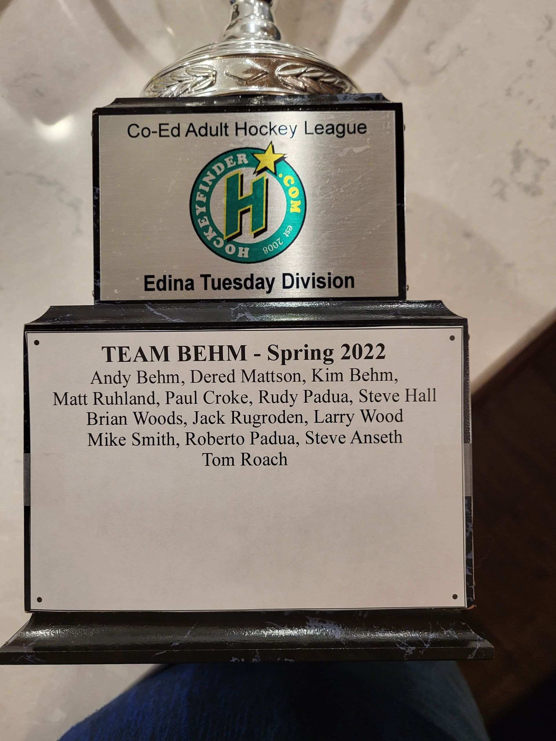 A trophy for the Co-Ed Adult Hockey League, Edina Tuesday Division, awarded to Team Behm, Spring 2022.