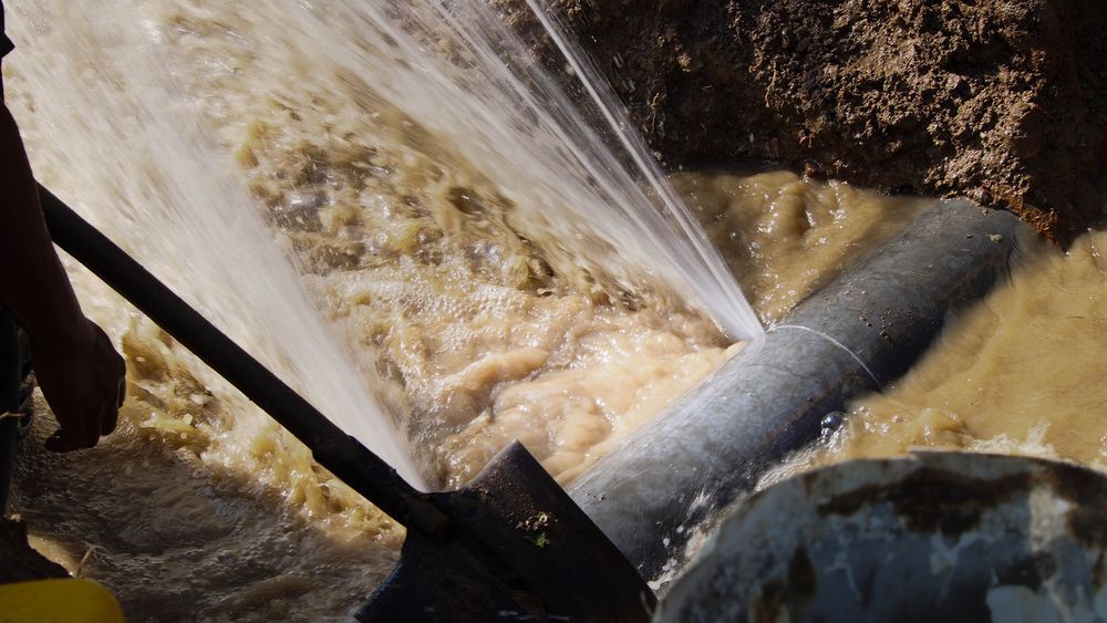 Broken Water Pipe Spews Water in a Trench — Start 2 Finish Plumbing in West Ryde, NSW