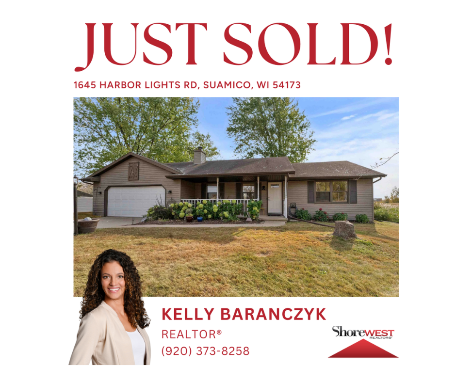 A vase of flowers is sitting on a table next to a window.