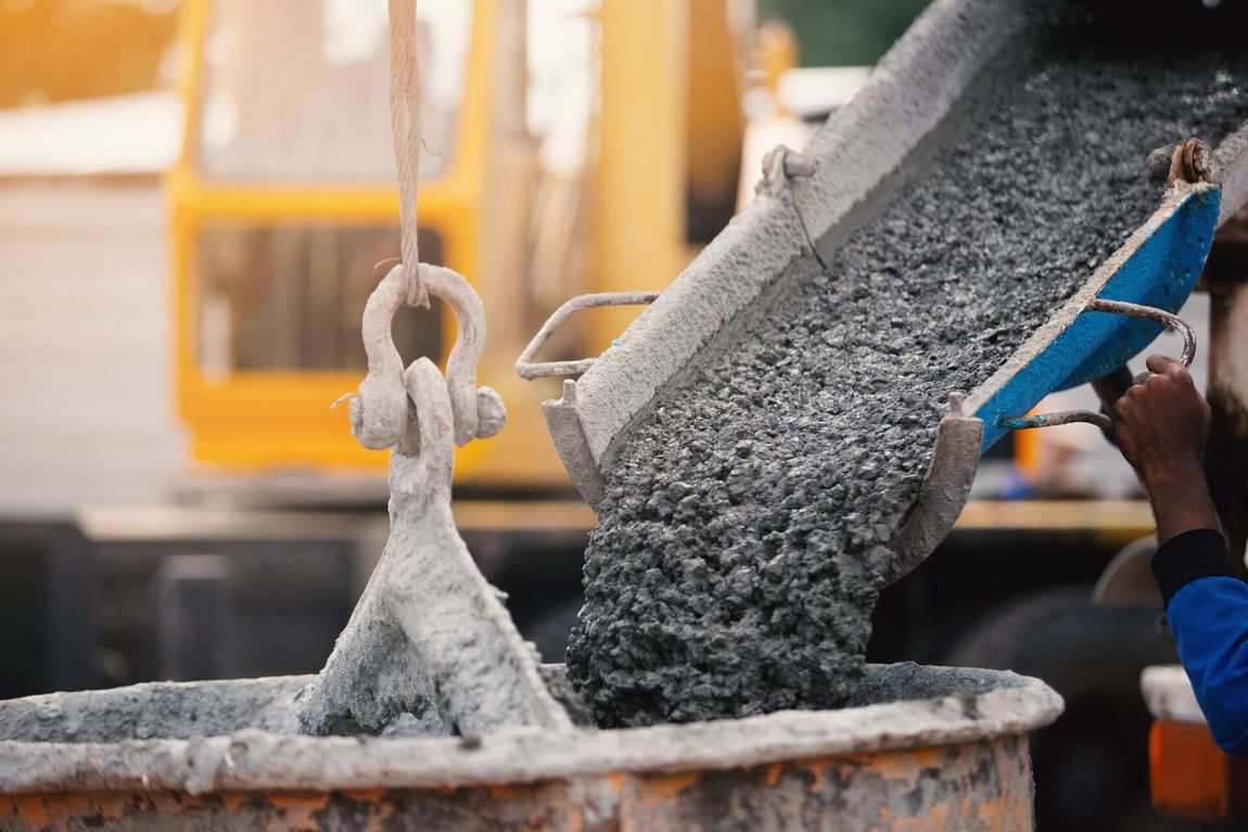 Cement mix being poured in a container