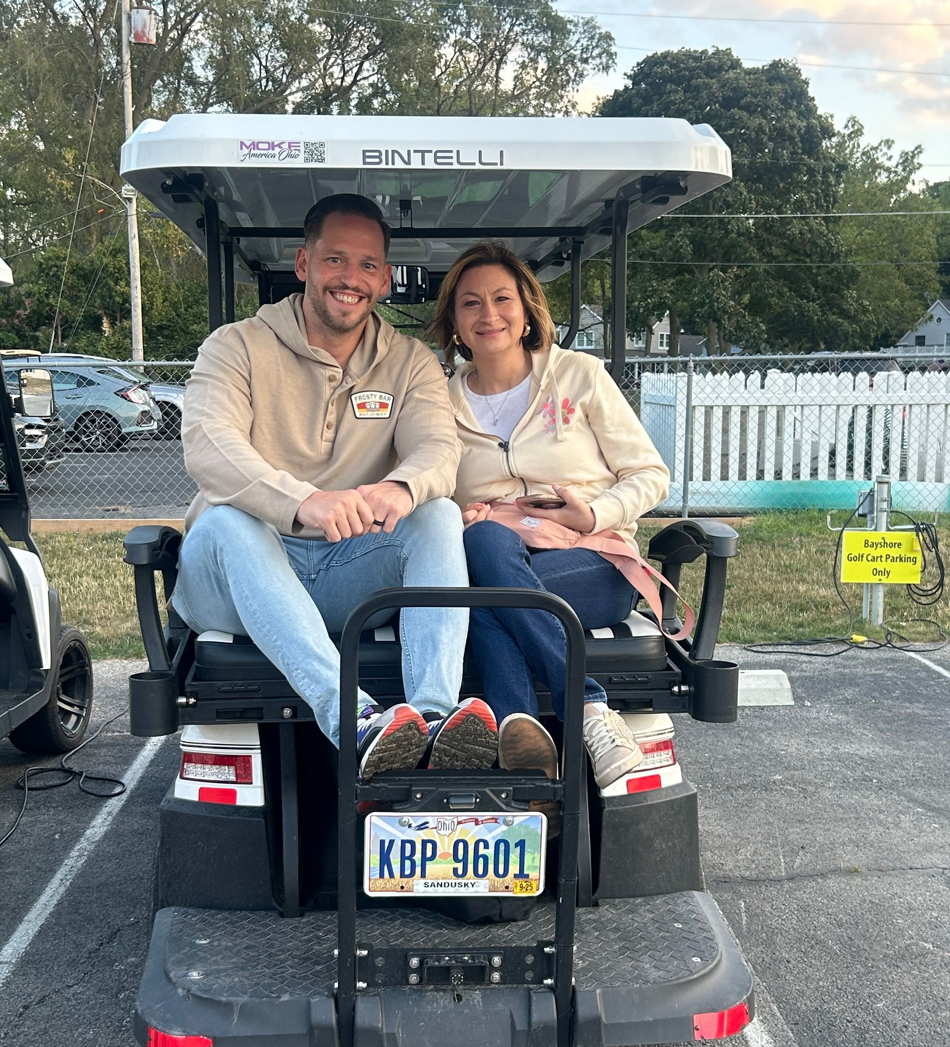 Family posing in front of Cinderella Castle at Disney World.
