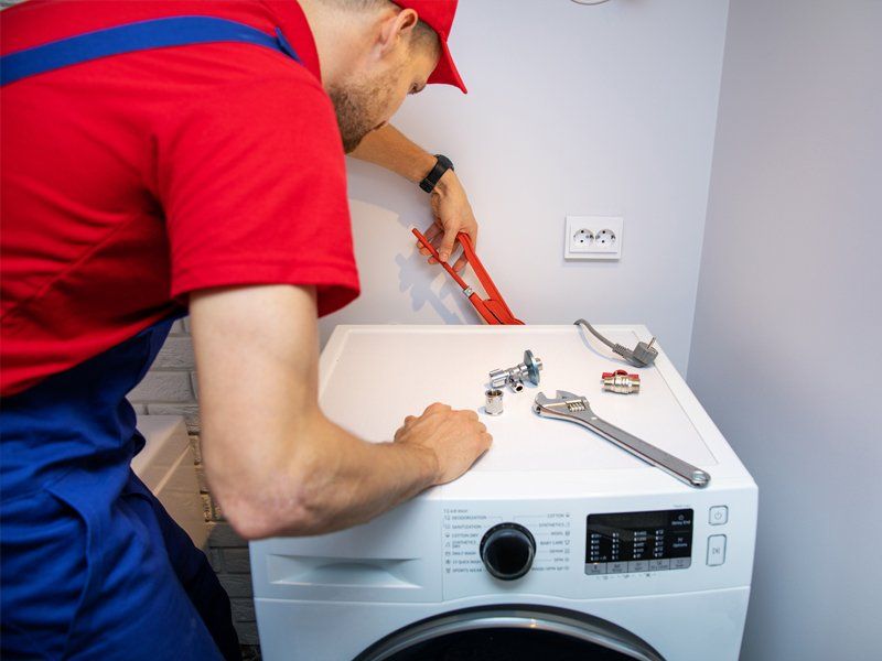 Man Repairing Appliance — Kingsport, TN — Milhorn Appliance