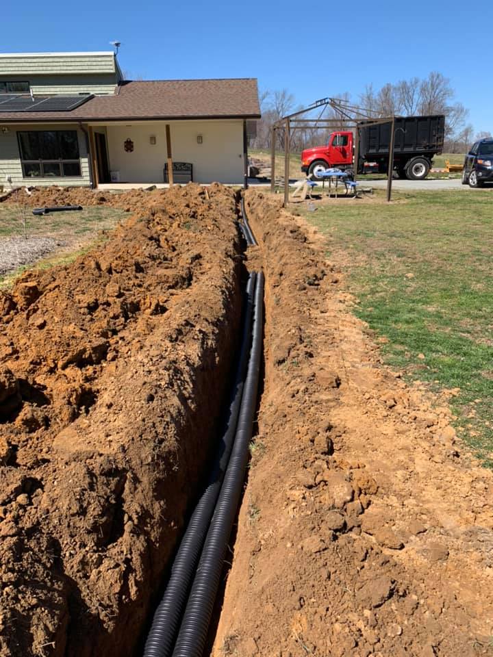 trenching to extend downspout
