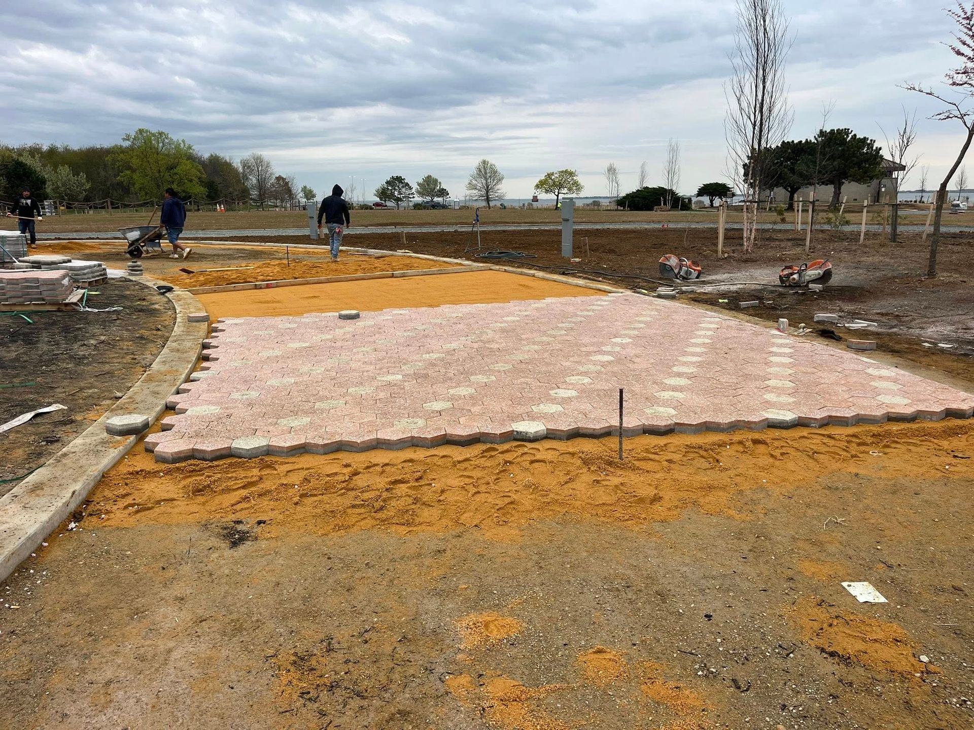 A traffic circle in an Annapolis park is being built using pavers.
