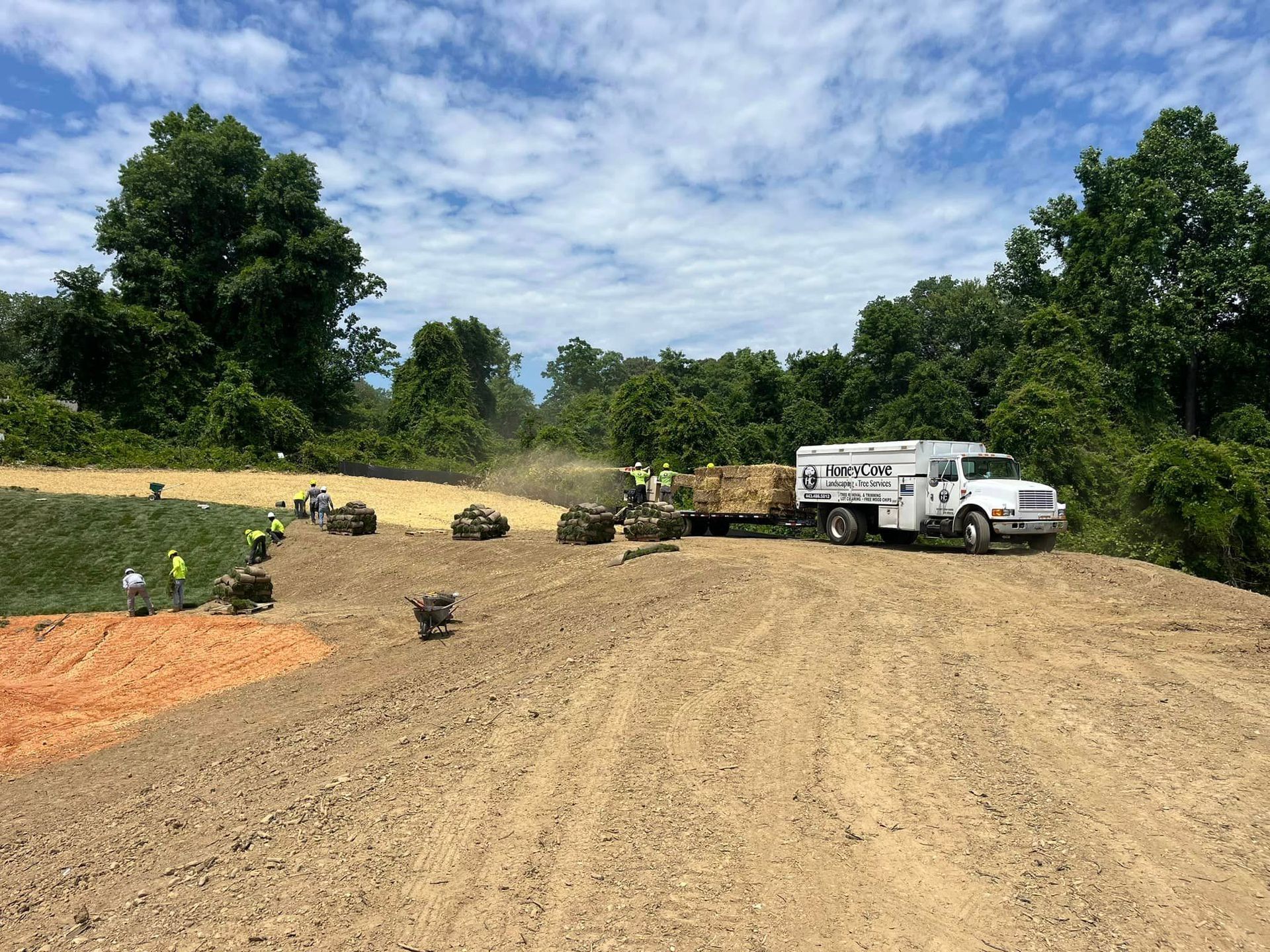 HoneyCove crew stabilizing stormwater pond for a commercial site.