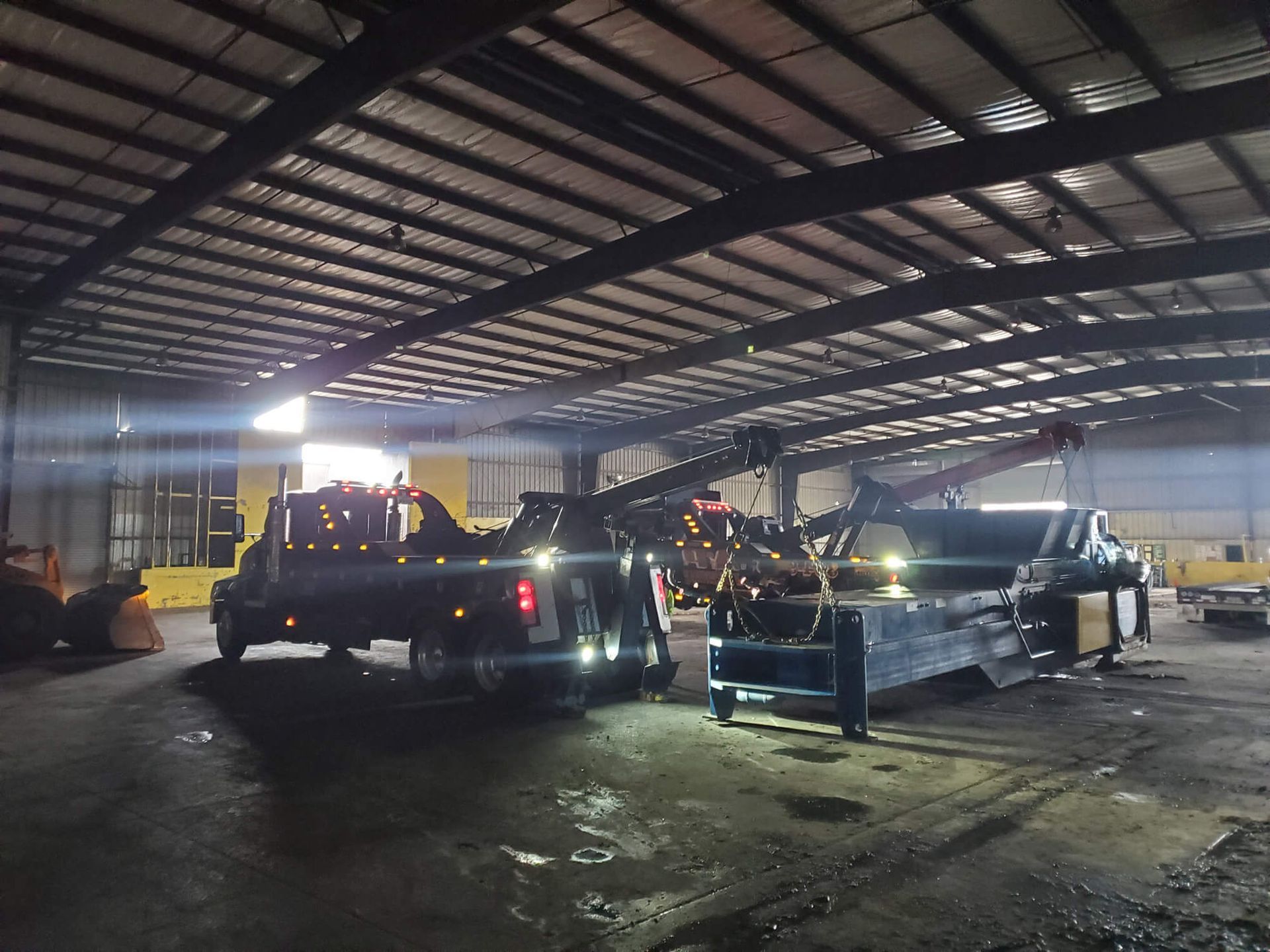 Mini excavator and track loader digging a hole in Roundrock, TX.