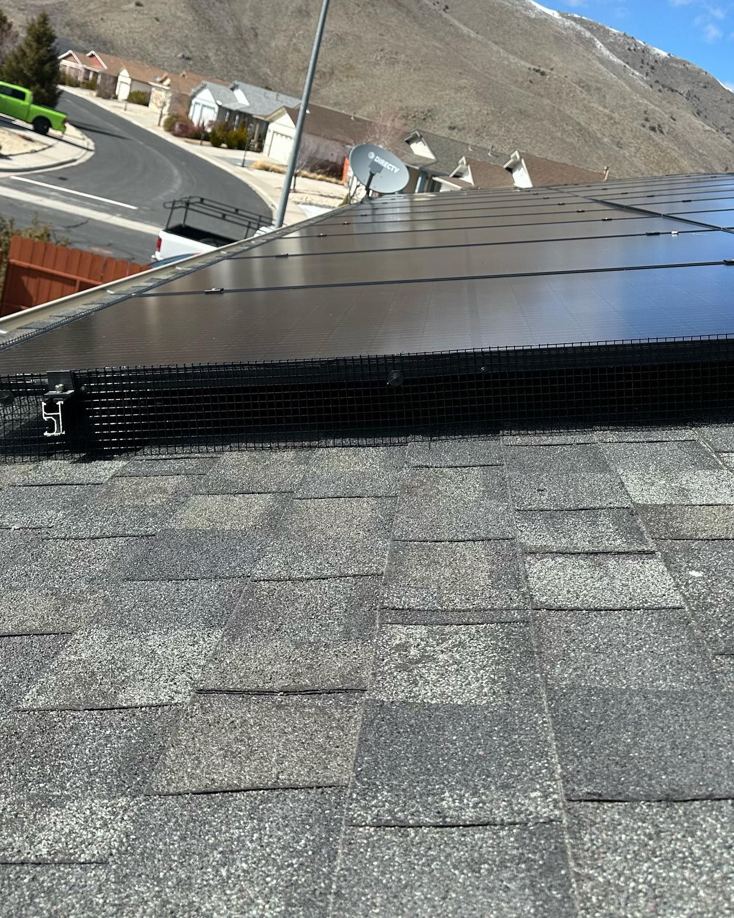 A roof with a lot of solar panels on it