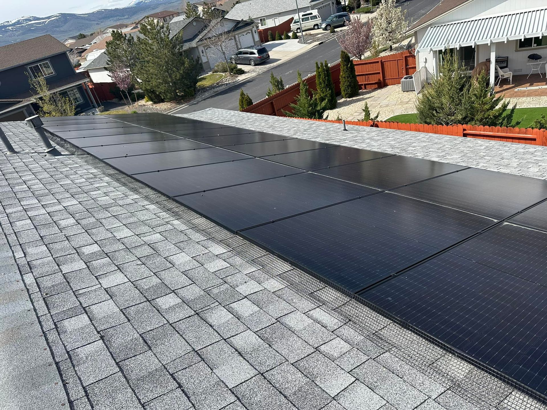 A roof with a lot of solar panels on it