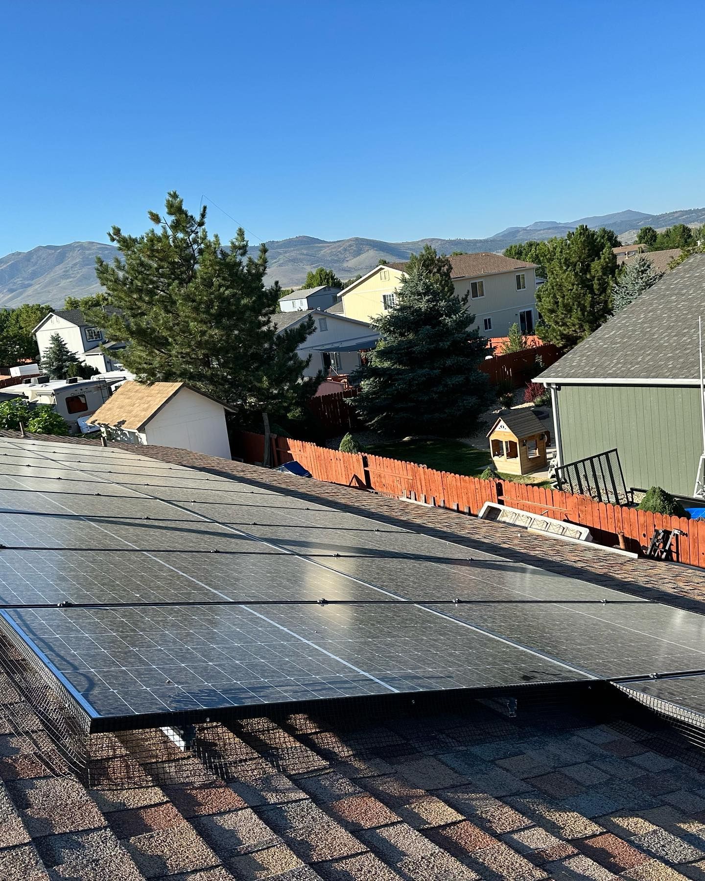 A roof with a lot of solar panels on it