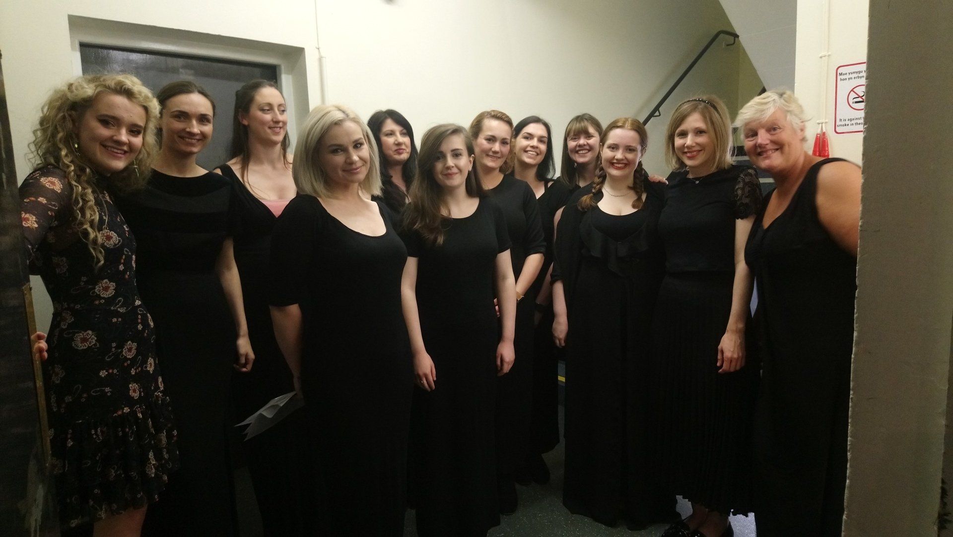 Caucasian girls singing in music class