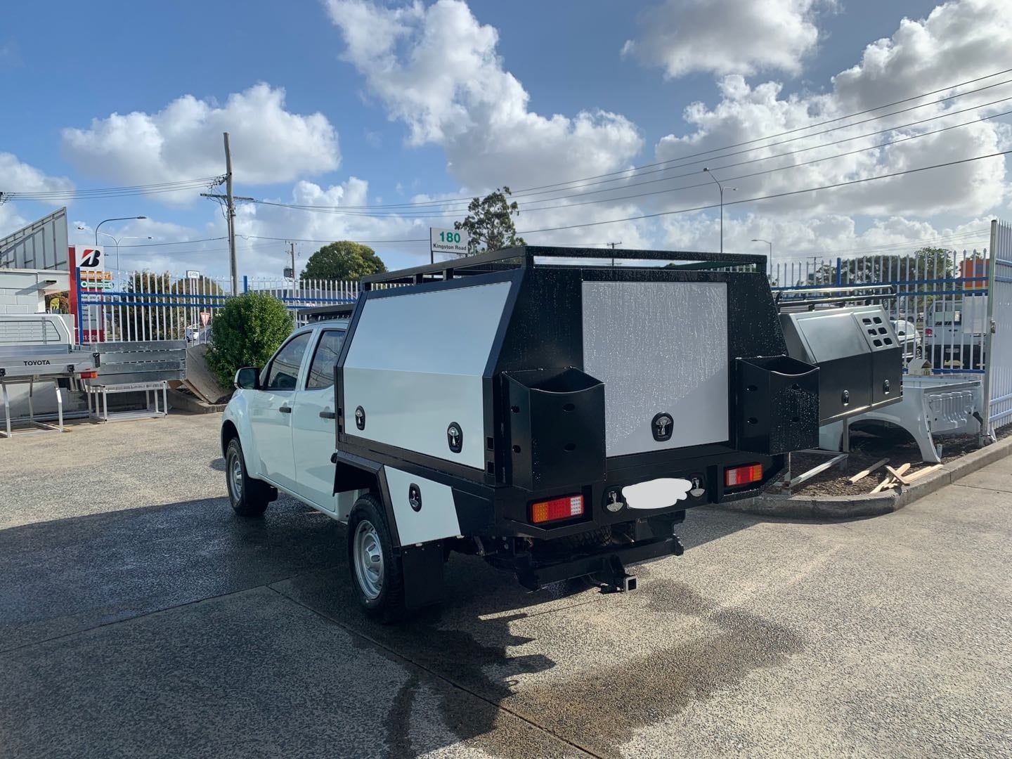 White Utility Truck With Black Canopy and Tray Parked Outdoors — PT Canopy In Slacks Creek, QLD