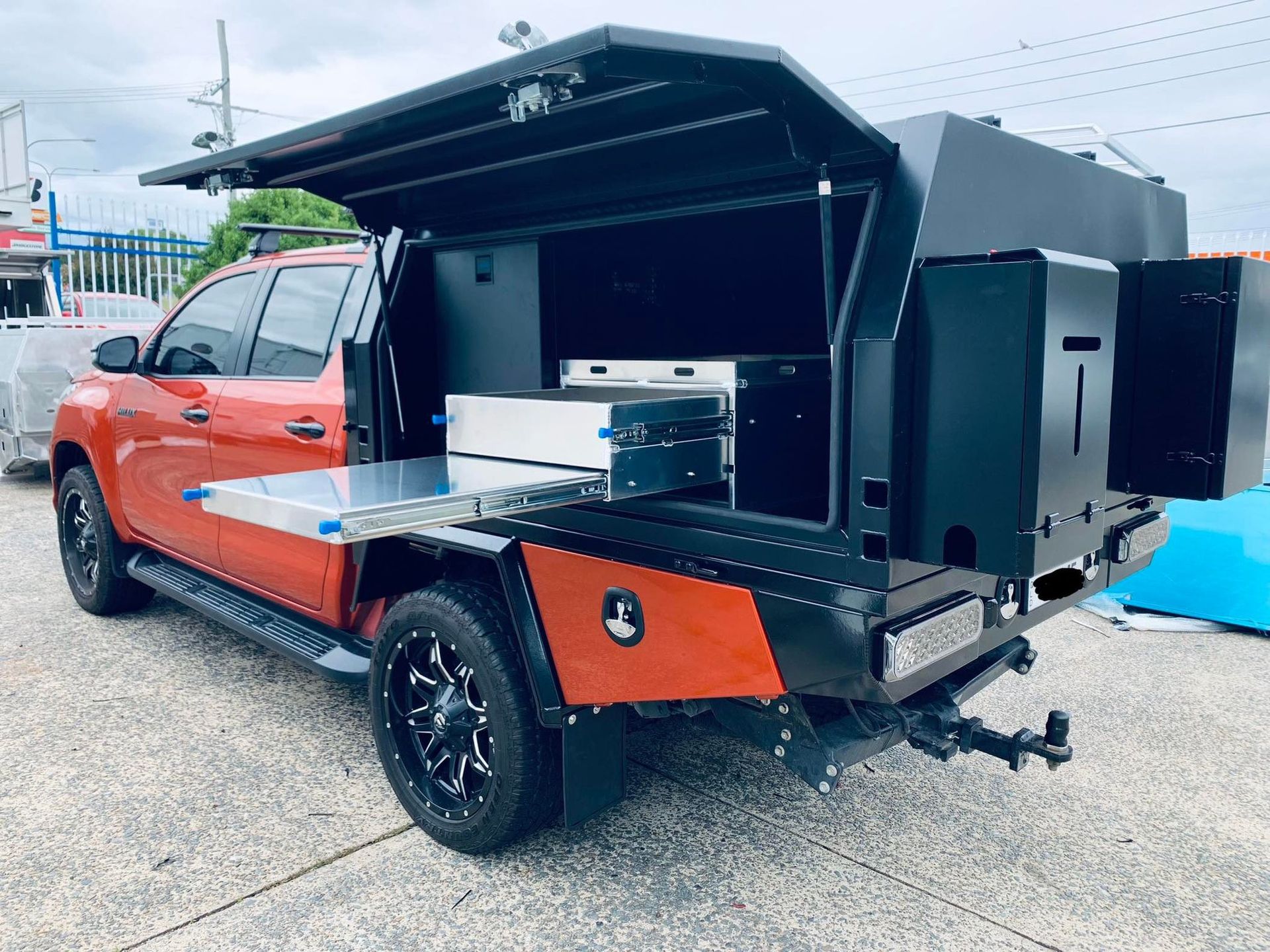 Orange Truck With Black Utility Canopy — PT Canopy In Slacks Creek, QLD