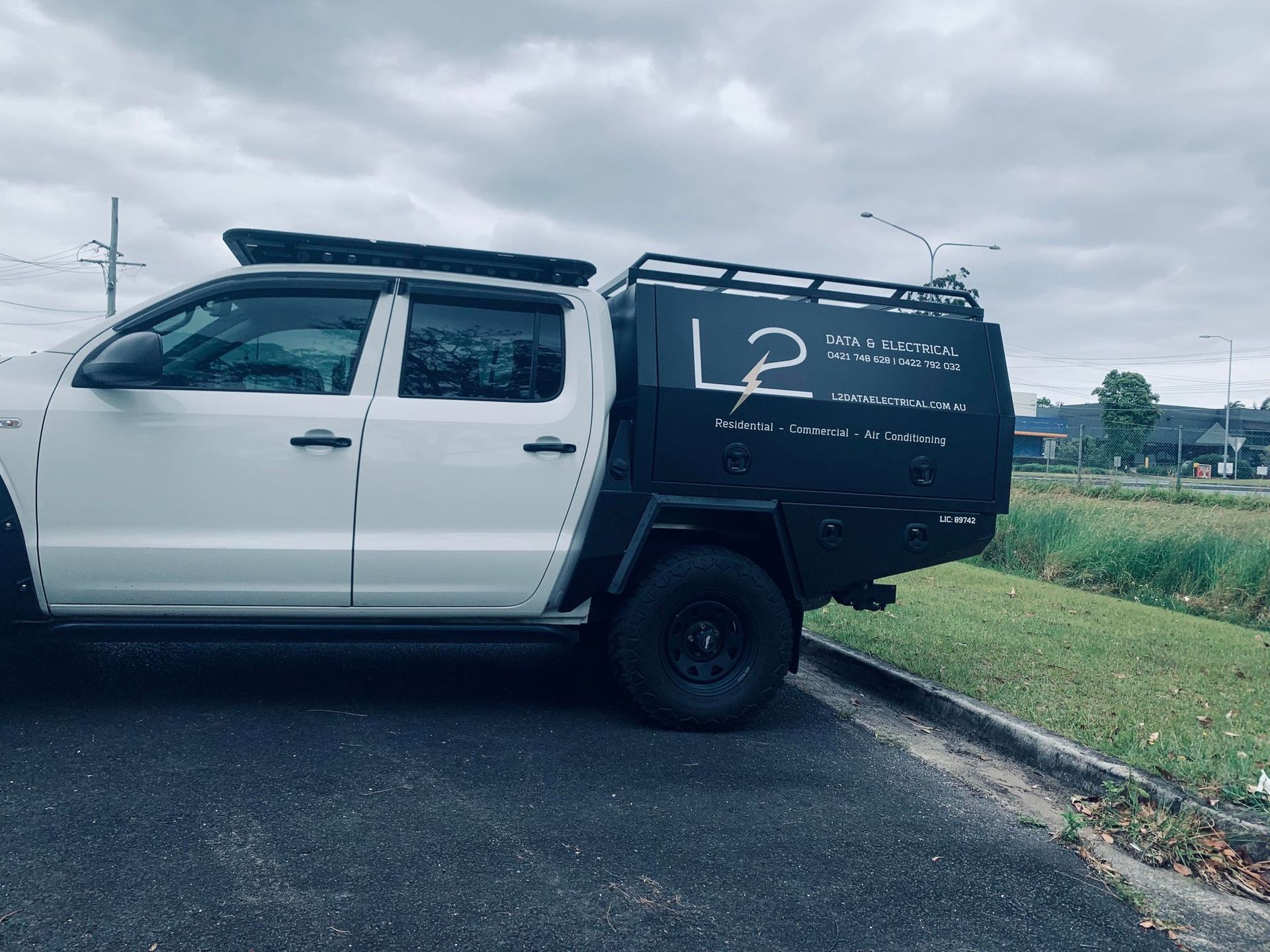 White Pickup Truck With a Black Utility Bed — PT Canopy In Slacks Creek, QLD