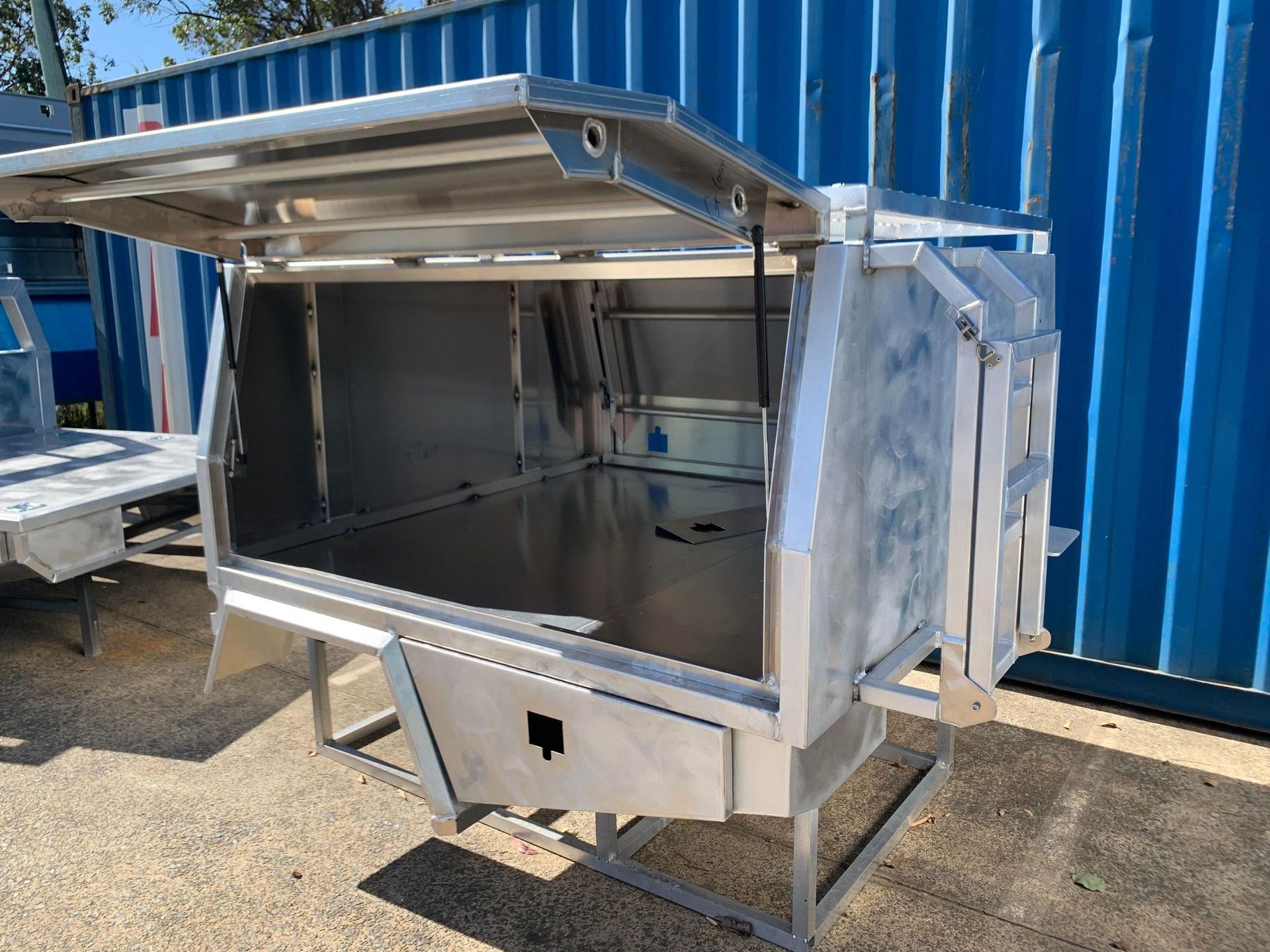 Aluminum Truck Utility Body With Open Lid and Side Compartments — PT Canopy In Slacks Creek, QLD