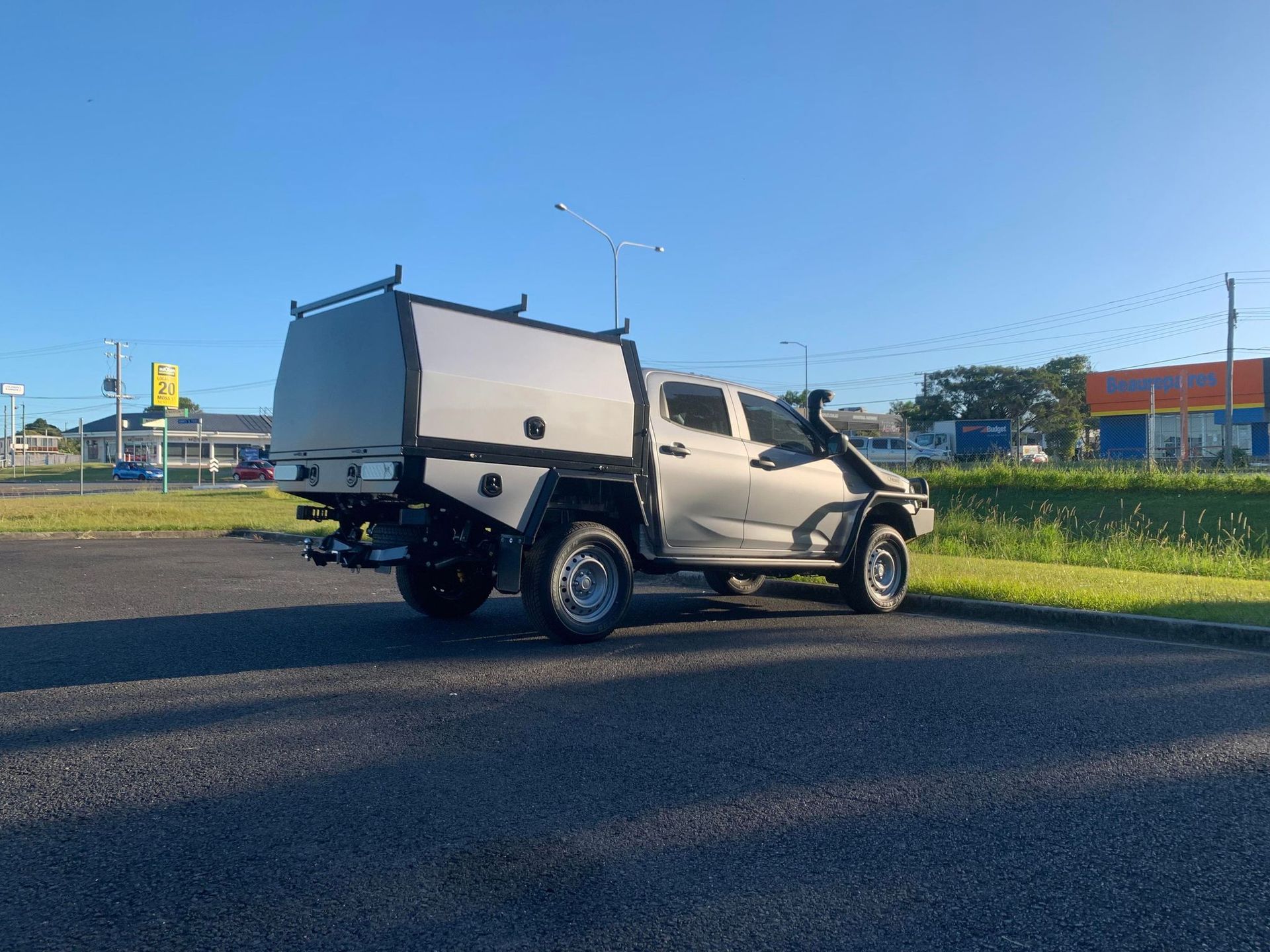 Silver Pickup Truck With a Utility Canopy Parked on Asphalt in an Outdoor Place — PT Canopy In Slacks Creek, QLD