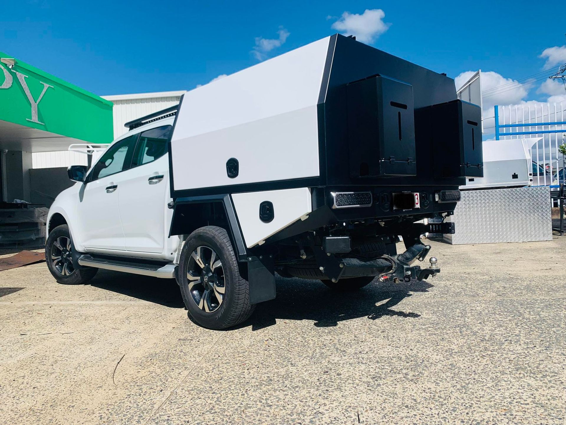 White Pickup Truck With a Custom Black and White Camper Shell — PT Canopy In Slacks Creek, QLD
