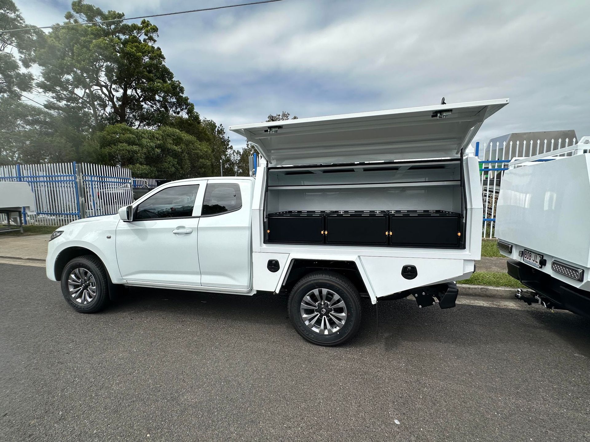White Pickup Truck With Utility Canopy With Storage Compartments — PT Canopy In Slacks Creek, QLD