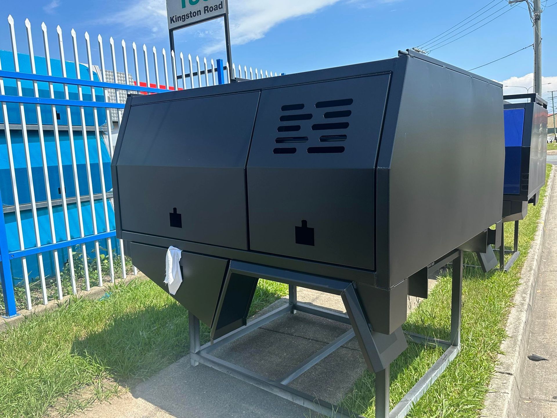 Black Utility Truck Canopy With Vents and Doors on a Metal Frame — PT Canopy In Slacks Creek, QLD
