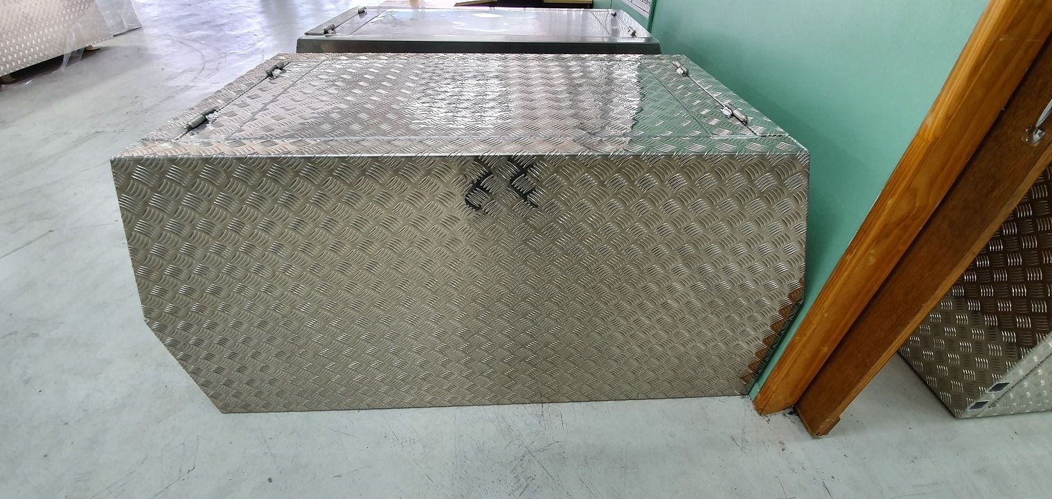 A Diamond-Plated Metal Storage Box Leaning Against a Wooden Beam — PT Canopy In Slacks Creek, QLD