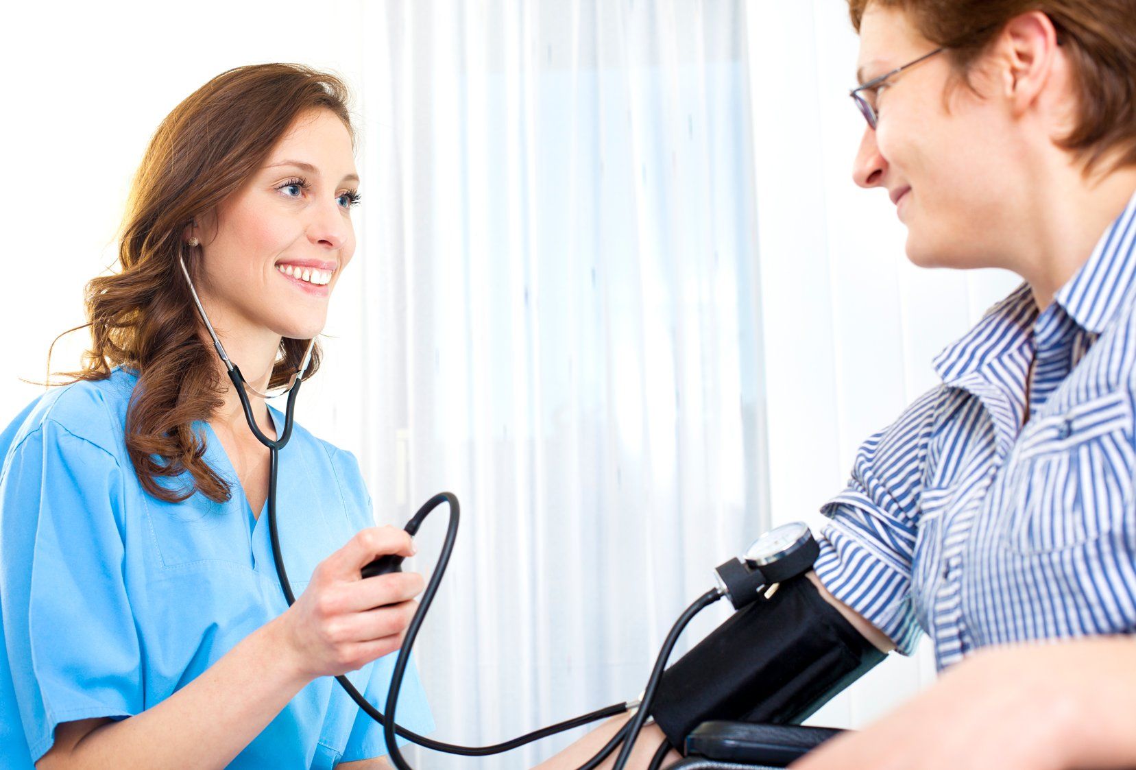 Doctor Doing Blood Pressure — Arlington, TX — SFAHP