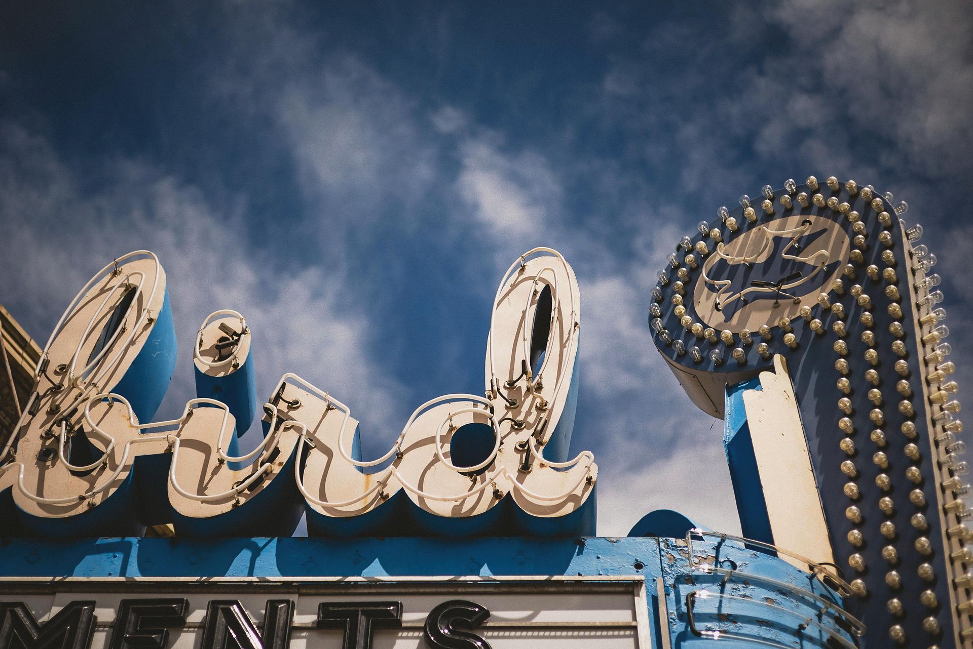 Blue and white vintage theater sign 