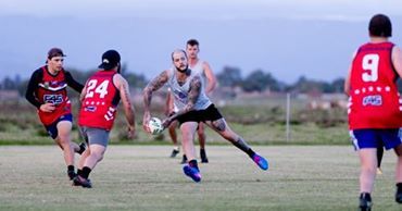men playing rugby