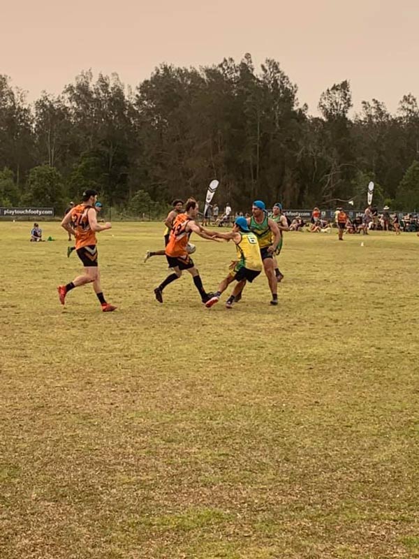 group of people playing rugby