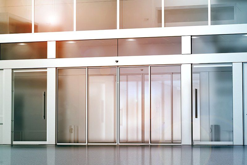 Commercial Glass Repair — Commercial Building with Glass Doors in Louisville, KY