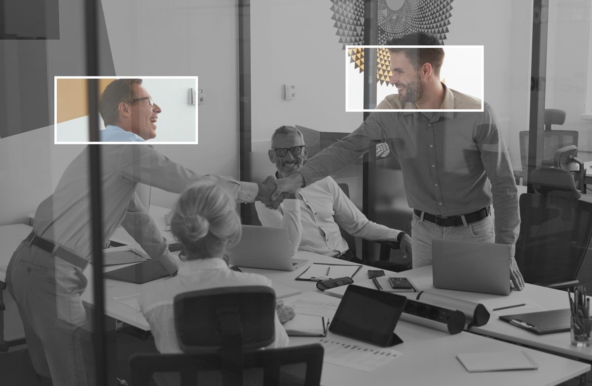 A group of recruiters and specialists are having a meeting in a conference room