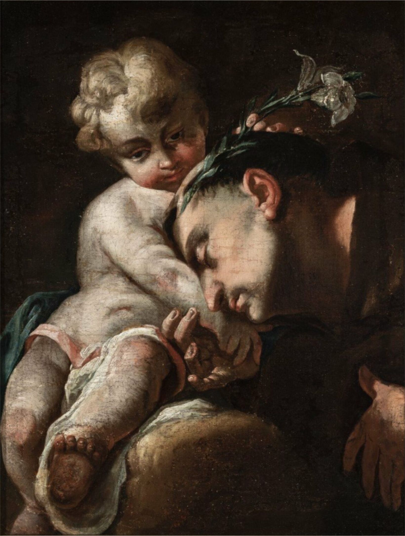 A man is holding a baby in his arms in a painting.