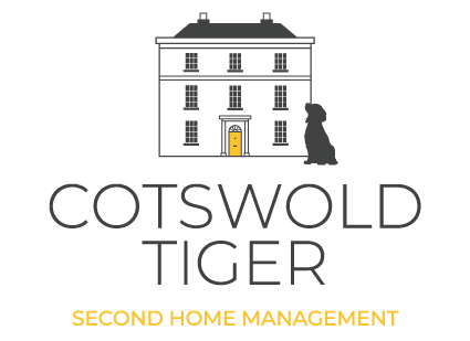 orange key on white background, Cotswold Tiger, The Second Home Company logo
