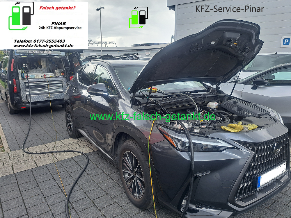 A grey Lexus with its hood open is being serviced by a Pinar Abpumpservice roadside assistance van in a parking lot.